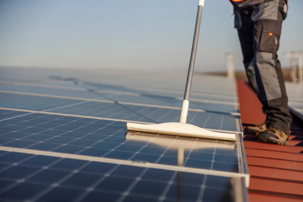 Solar panel cleaning on a rooftop array